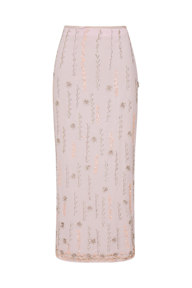 Long skirt with embroidery and beading all over in the form of a zig zag pattern with stars, finished with a fixed waistband.