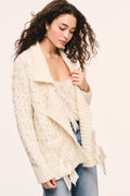 Windel ivory knit cardigan, ivory textured knit cardigan, open front with shawl collar, ribbon laced through the front, and ribbon bows on the pockets