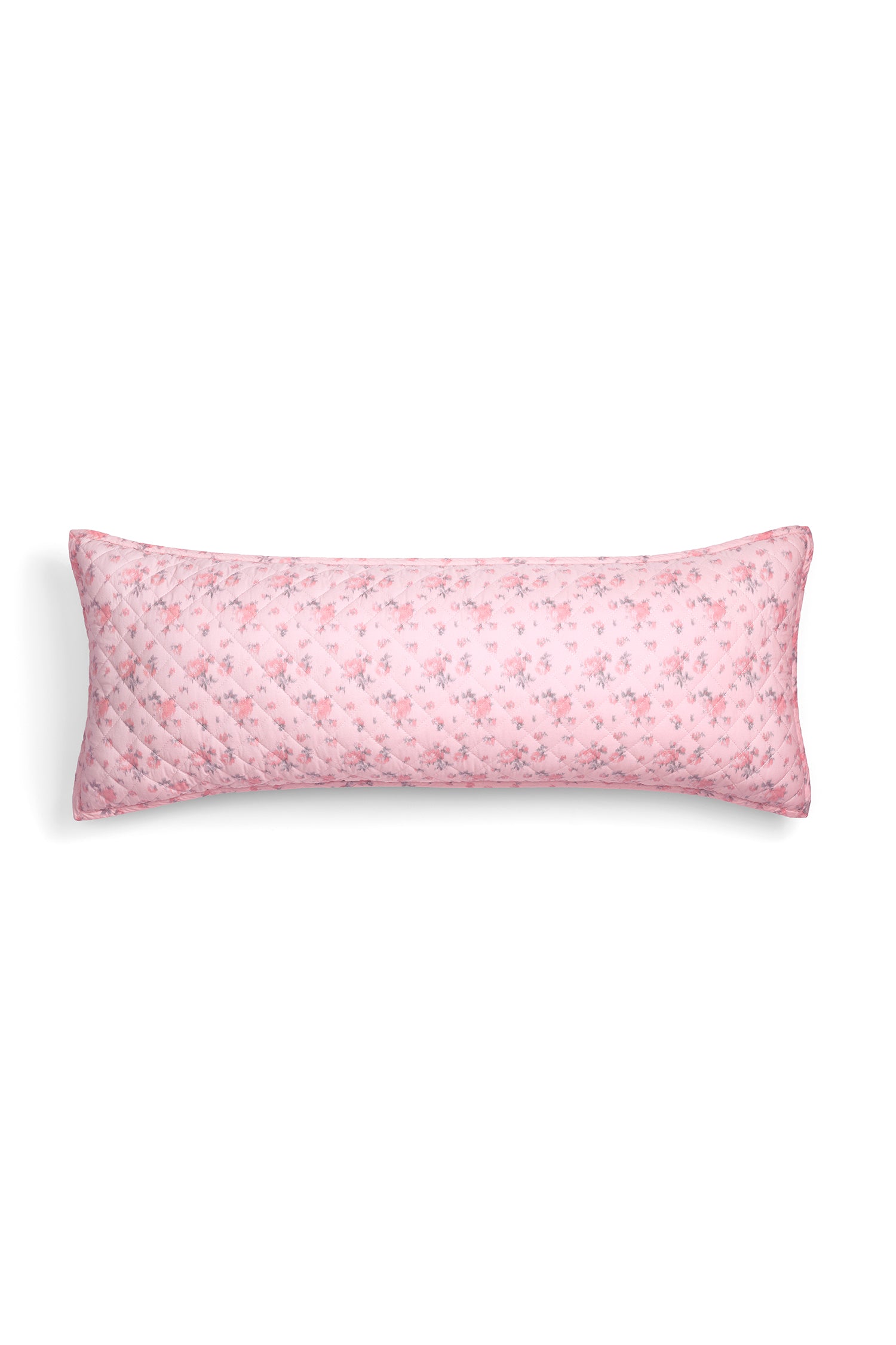 A beautiful lumbar pillow with a delicate pink floral print and diamond stitching.
