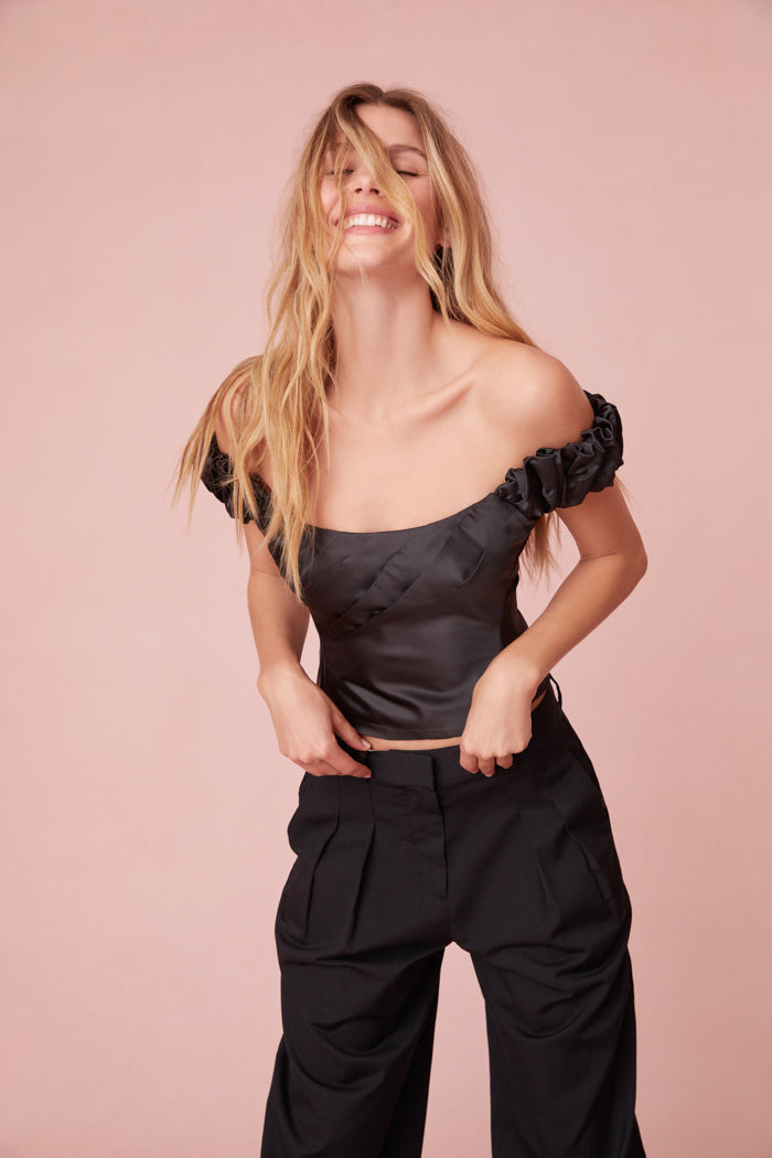 Off-the-shoulder top in luxe satin fabric.