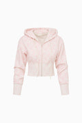 Pink hoodie with a subtle pattern on a white background