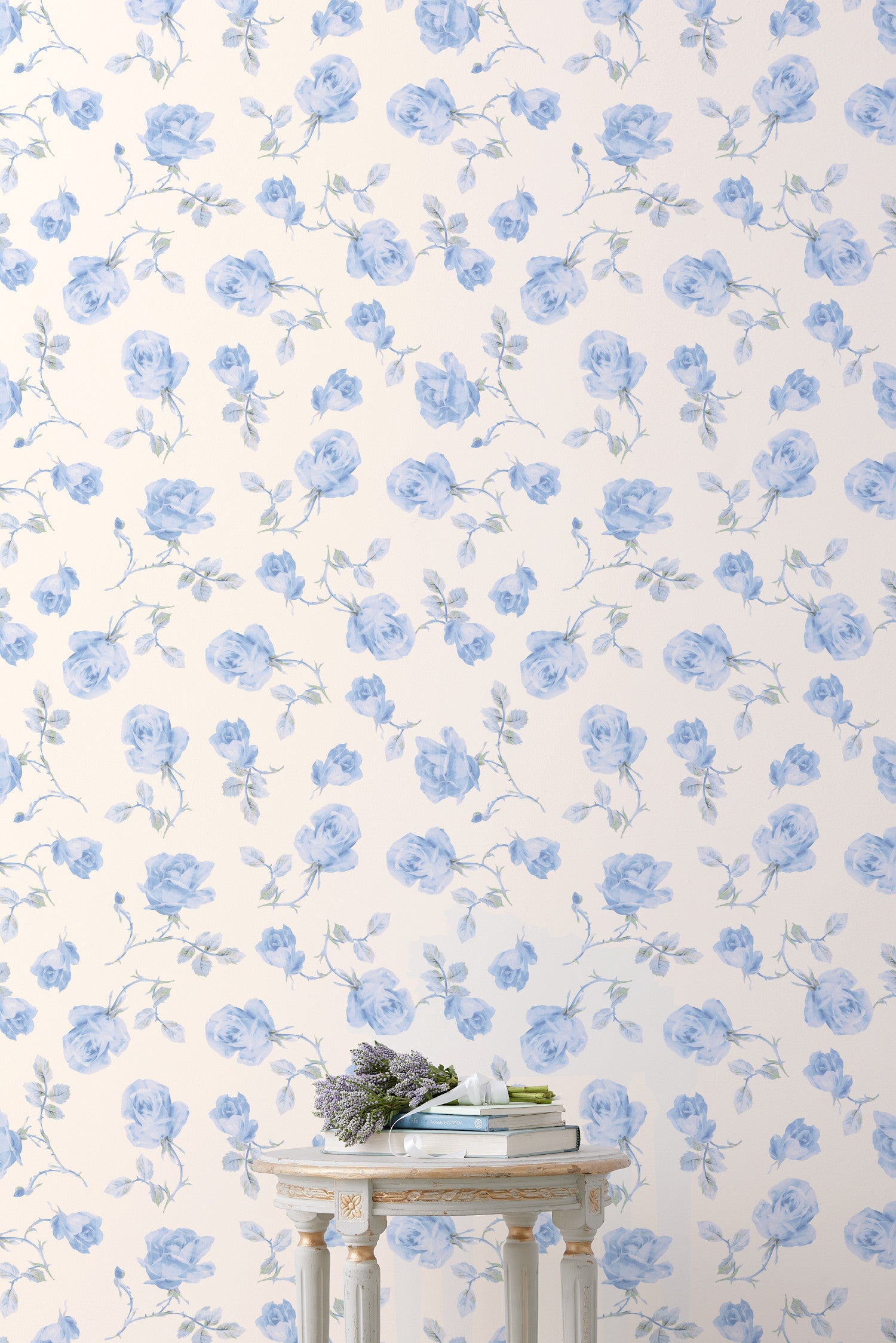  Introducing a delicate blue rose print wallpaper featuring a soft antique white background. This wallpaper exudes elegance with its large, intricately detailed roses. 