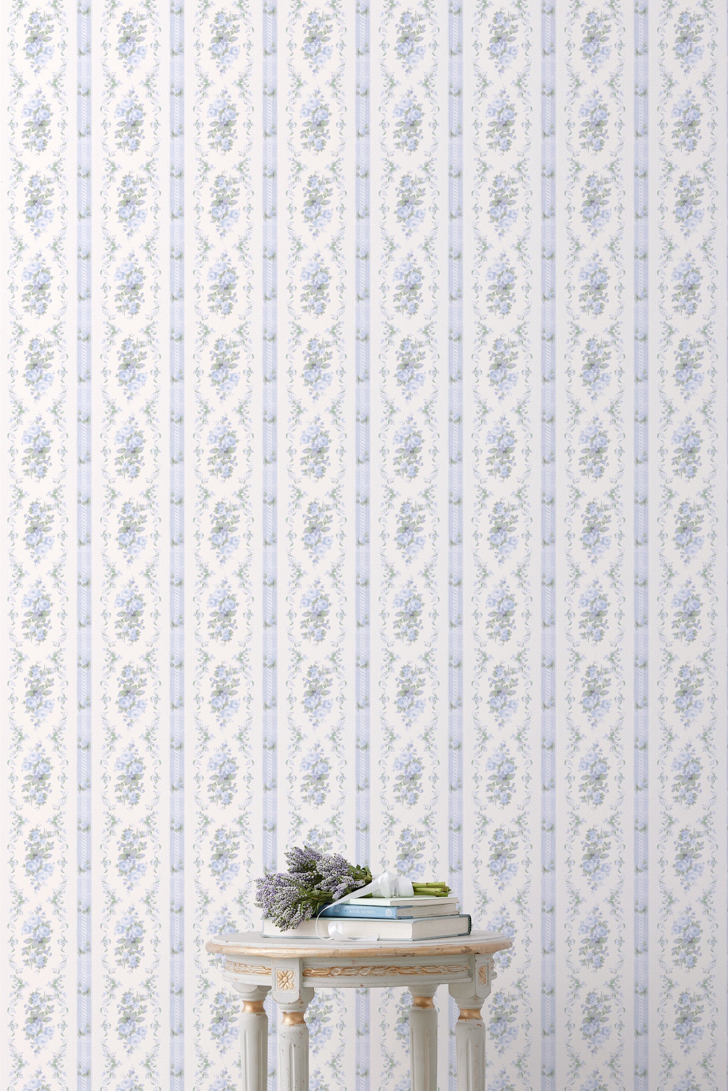 This design showcases beautiful baby blue floral prints delicately scattered across a pristine white backdrop. Adding to its visual appeal, a subtle blue strip elegantly separates the floral patterns, creating a sense of depth and space.