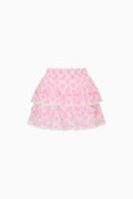 Pink tiered skirt with pink heart pattern on a white background