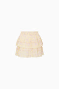 Yellow tiered skirt with floral pattern on a white background