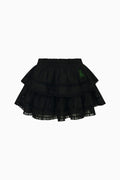 Black tiered skirt with lace trim on a white background