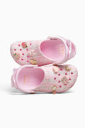 Pink clog shoes with decorative elements on a white background