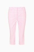 Pink gingham pants on a white background