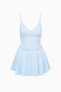 Light blue dress with a pattern on a white background