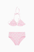 Pink bikini set with lattice bow pattern on a white background