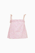 Pink floral top with thin straps on a white background