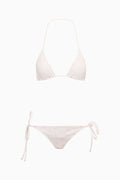 White floral bikini top and bottom set on a white background