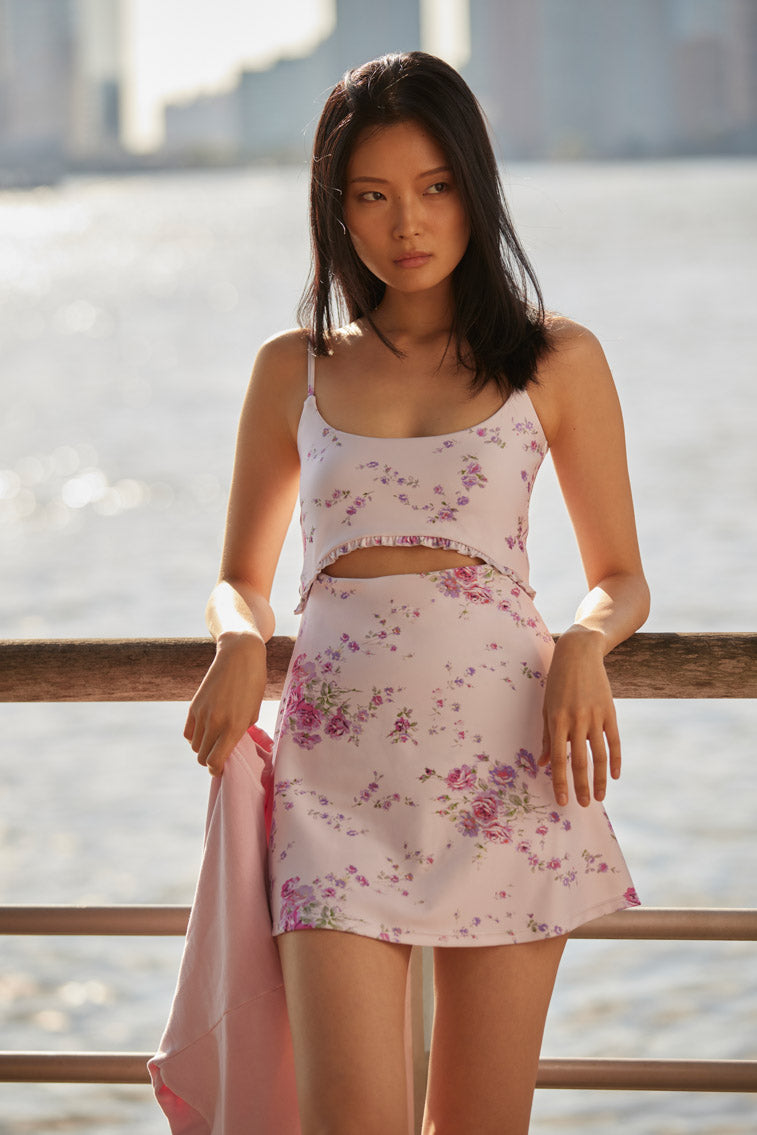 Floral active dress with a scoop neck, thin straps, and, a keyhole detail at center front.