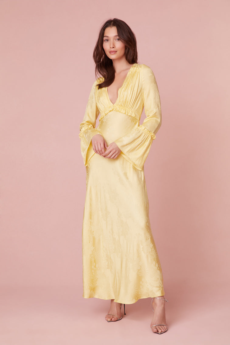 Maxi dress in silk jacquard featuring a subtle large-scale floral pattern.