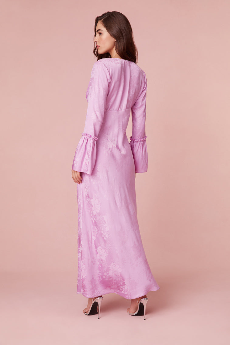 Maxi dress in silk jacquard featuring a subtle large-scale floral pattern.