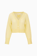 Yellow cardigan on a white background