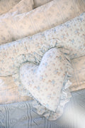 Blue, 100% cotton chic throw blanket. Featuring heart and bow-stripped pointelle details.