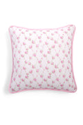 Linen throw pillow, white base with pink floral allover print and pink-trim piping, square