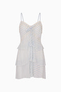 White and blue striped and tiered mini dress on white background
