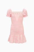 Pink checkered dress with puff sleeves on a white background