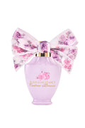 Pink mini eau de parfum bottle with large purple floral bow and gold cap
