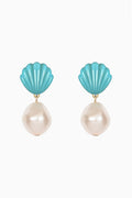 A pair of drop earrings featuring turquoise blue scallop-shaped tops and large, lustrous cream pearl drops, set with small gold accents on a plain white background.