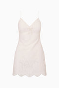 Ivory lace dress on a white background