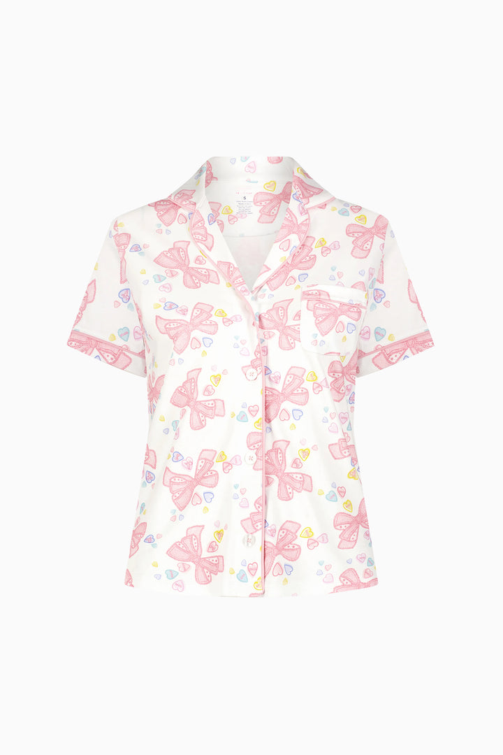 Light pink and white bow-print short-sleeve pajama top with button-front collar