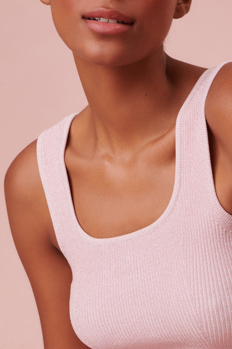 Tank top with ribbed stitching for a flattering shape and fit.