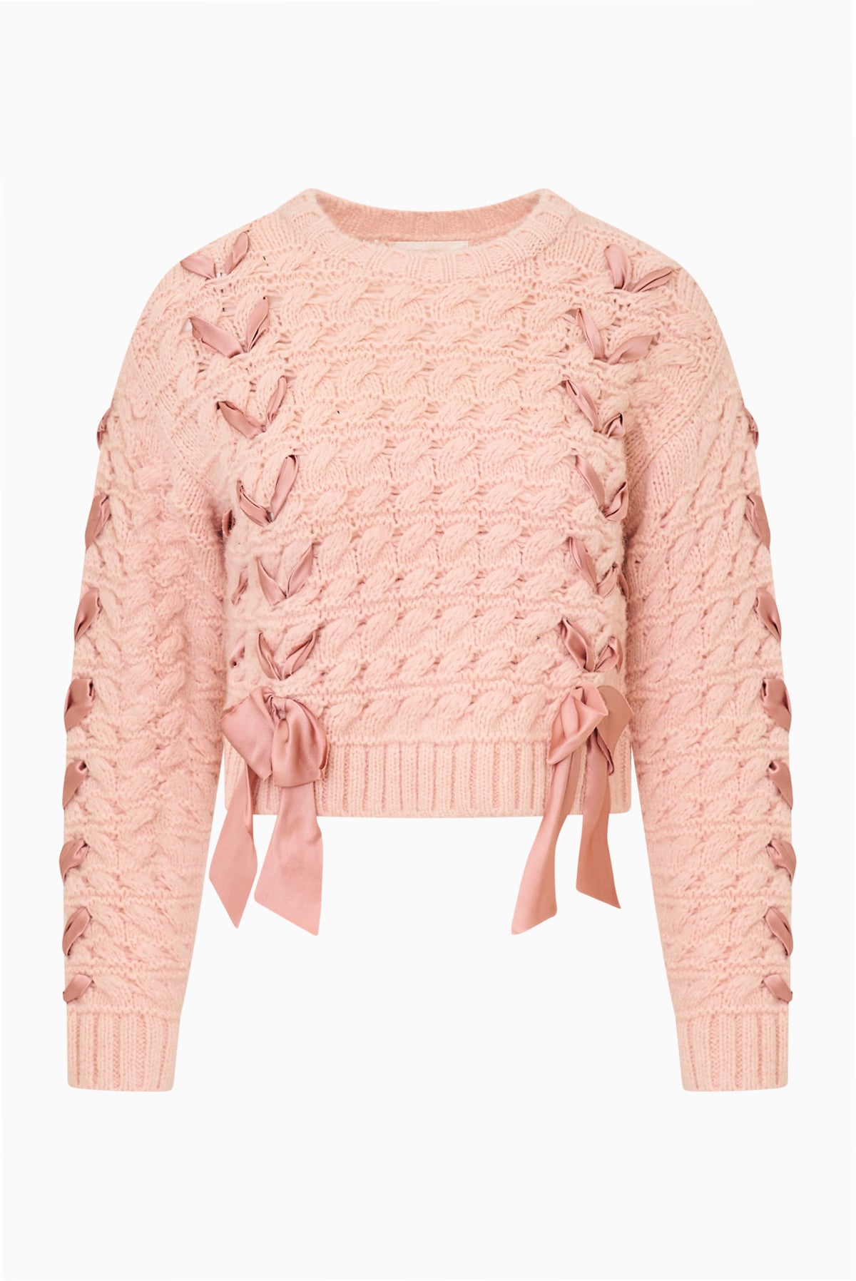 Pink textured knit pullover with crew neckline and ribbons laced down the front and bows at the hem