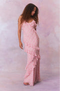 Pink floral chiffon maxi dress with spaghetti straps and ruffles that descend into the maxi skirt.