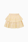Yellow tiered skirt with floral pattern on a white background
