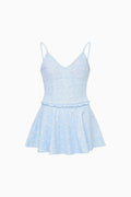 Light blue dress with thin straps on a white background