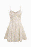 Floral sleeveless mini dress on a white background