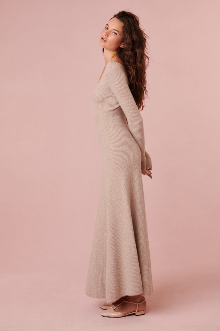 Maxi dress with a flattering fit that flares at the skirt.