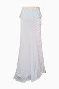 White pleated long skirt with blue strips on a white background