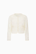 White textured cardigan on a white background