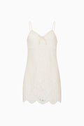 White lace dress on a white background