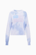 Light blue tie-dye long-sleeve sweater with American flag design on a white background