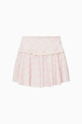 Pink skirt with lace details on a white background