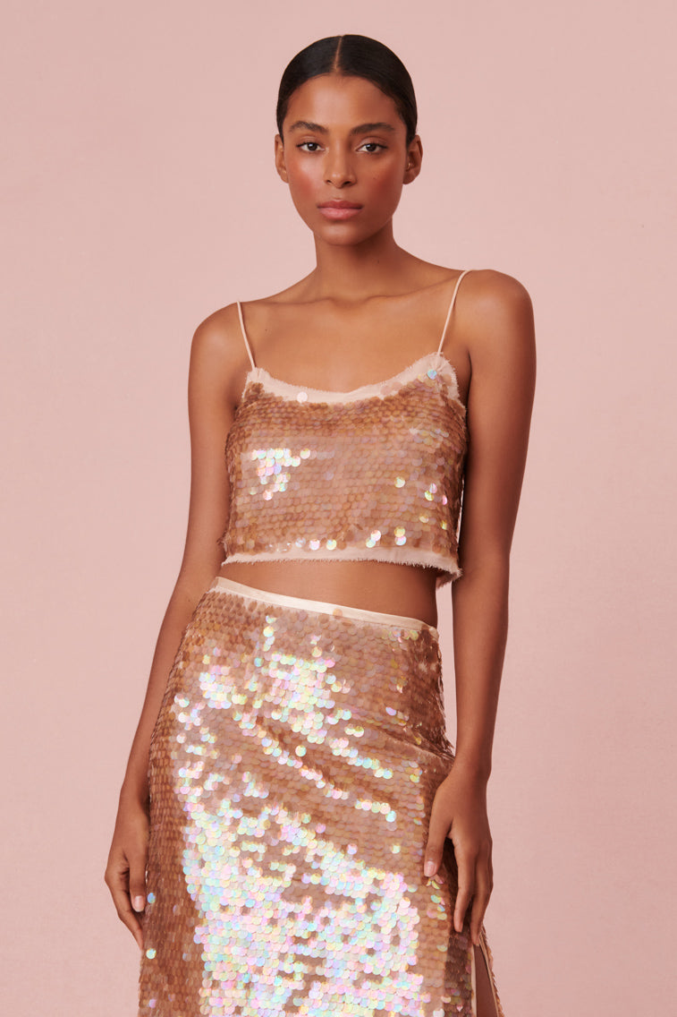 Spaghetti strap cropped cami with sequins.