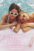 Two women lounging in a pool with text about perfume layers.