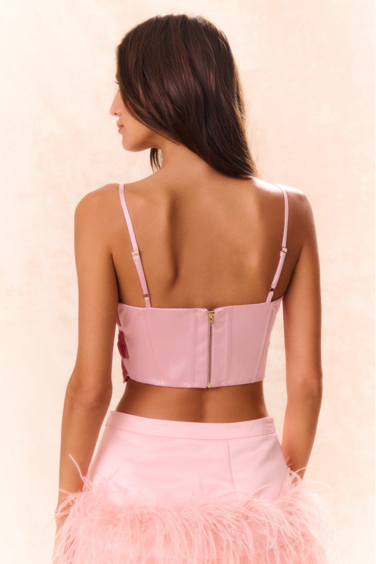 Pink bow back bustier top with thin straps and corset seams