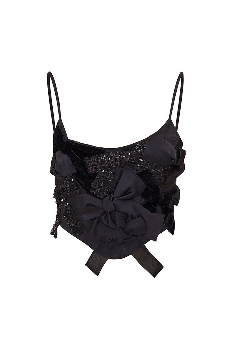Black bow bustier top with glittery patchwork and rosette detail, thin straps