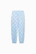 Light blue pants with a subtle pattern on a white background