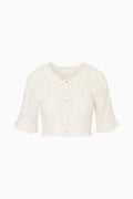 White lace cropped top with mid length sleeves on a white background