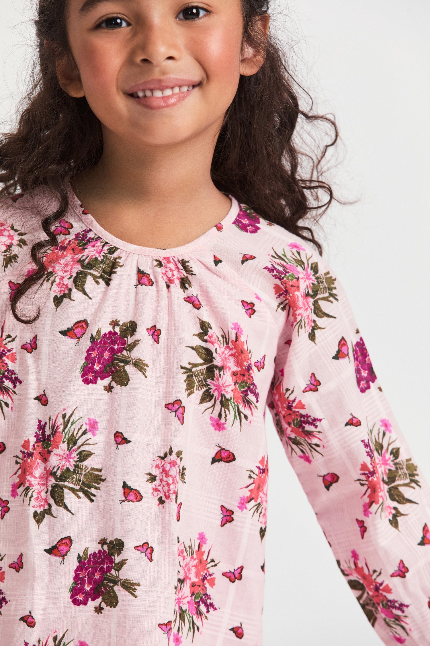 Girls floral pink print dress with long-sleeves.