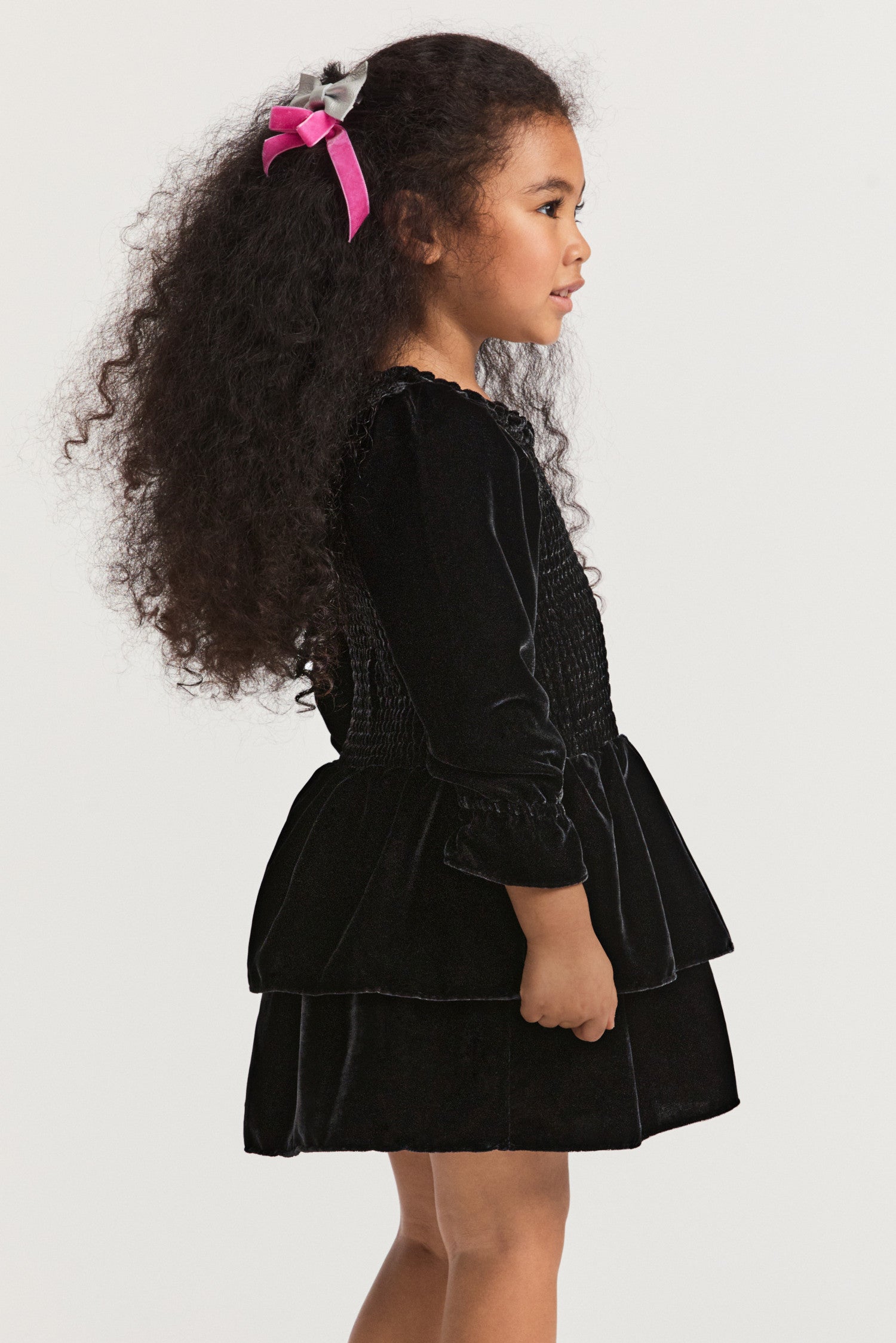 Girls mini black dress, long-sleeves with two layer ruffle skirt.