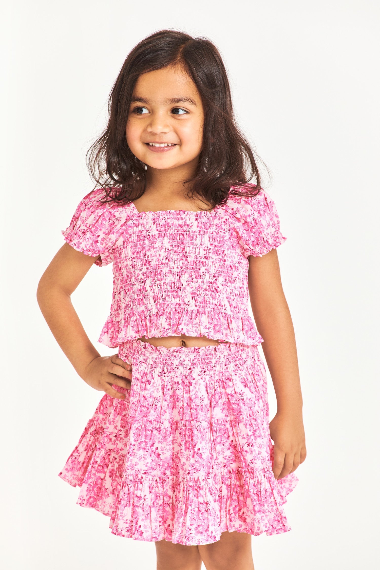 Pink smocked floral kids top with puff sleeves