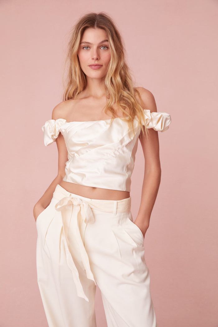 Off-the-shoulder top in luxe satin fabric.